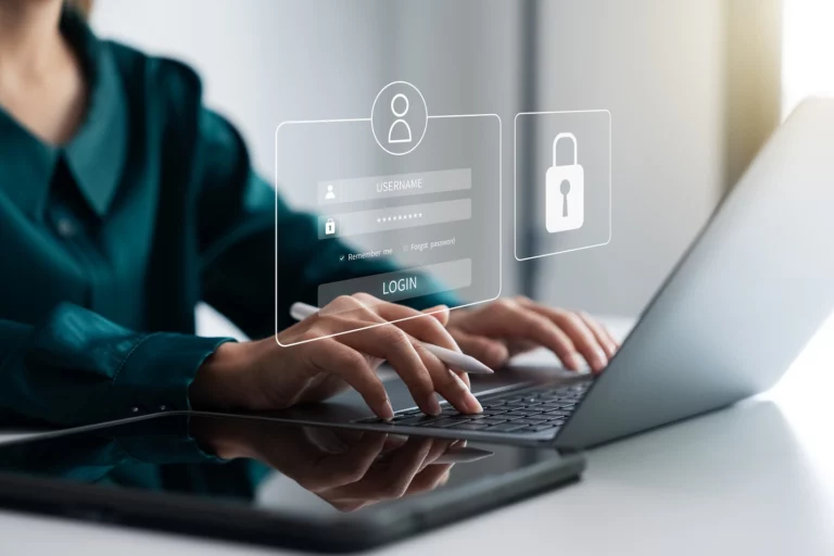 A person using a touchscreen to lock accounts—represents how businesses protect their data and manage team passwords.
