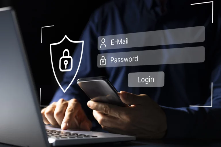 Person typing on a laptop to log into an account—represents how password managers help teams keep login info secure and easy to access.