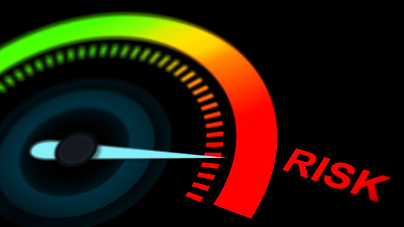 Risk gauge illustration showing levels from low to critical, symbolizing the need to align IT security with business risk.